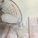 pouring anti frizz spray