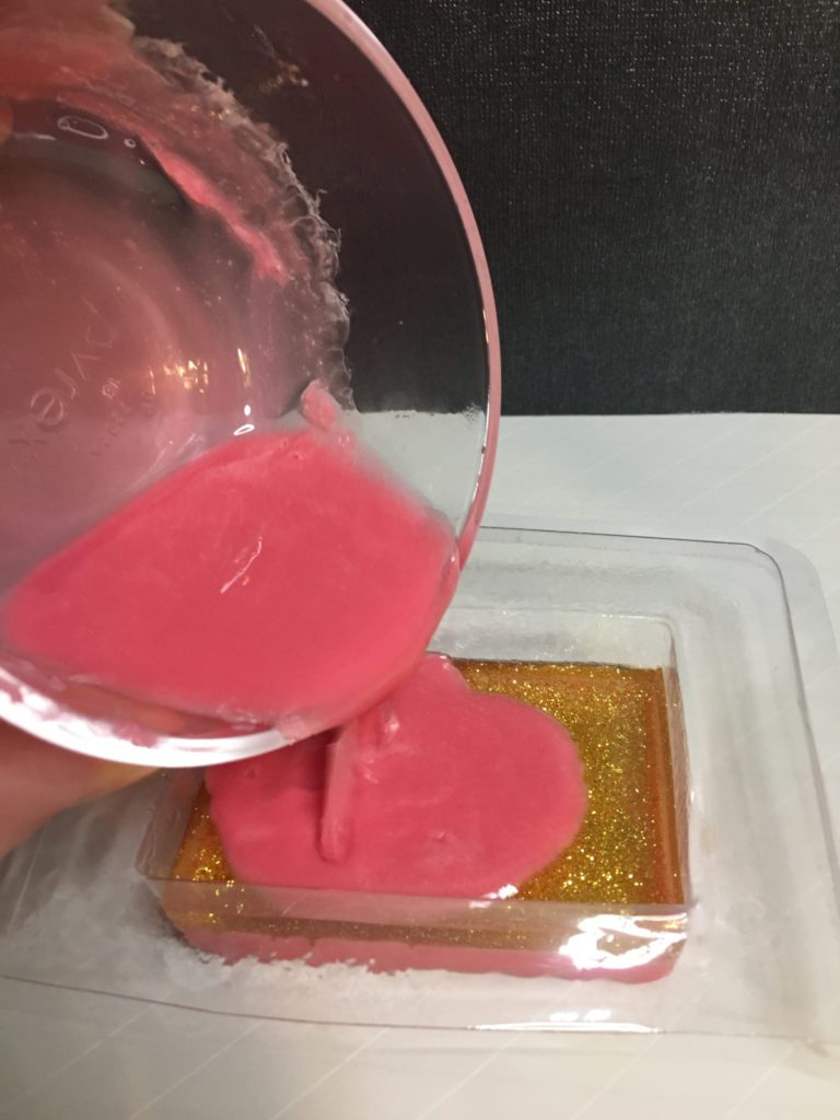 pouring last layer melt and pour.