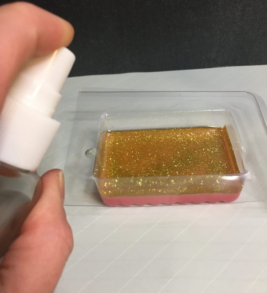 spray melt and pour layer before pouring next layer