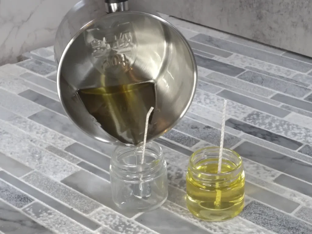 pouring massage oil candle