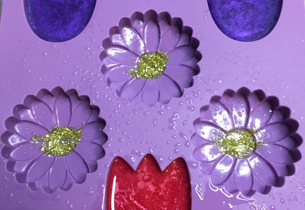 adding biodegradable glitter to soap