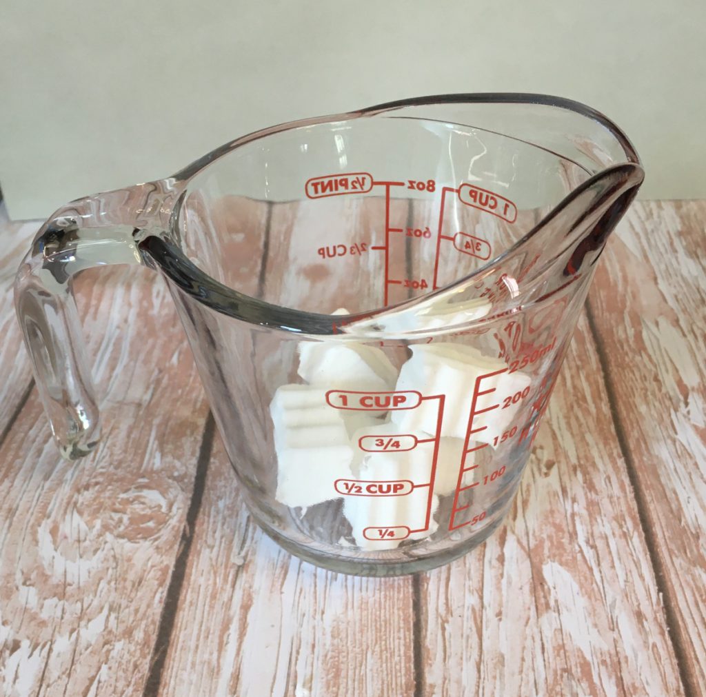 melt and pour soap placed into heat safe container