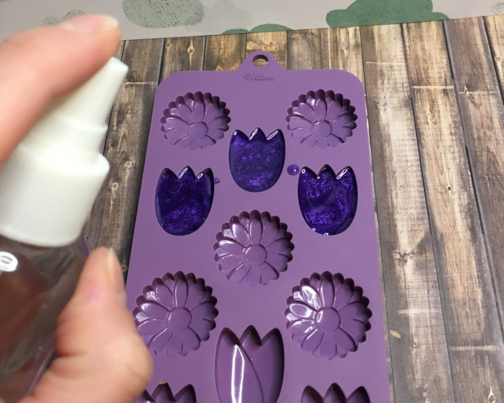 spraying purple embeds with rubbing alcohol
