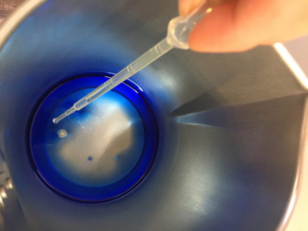 adding fragrance oil to soy wax for a floating candle