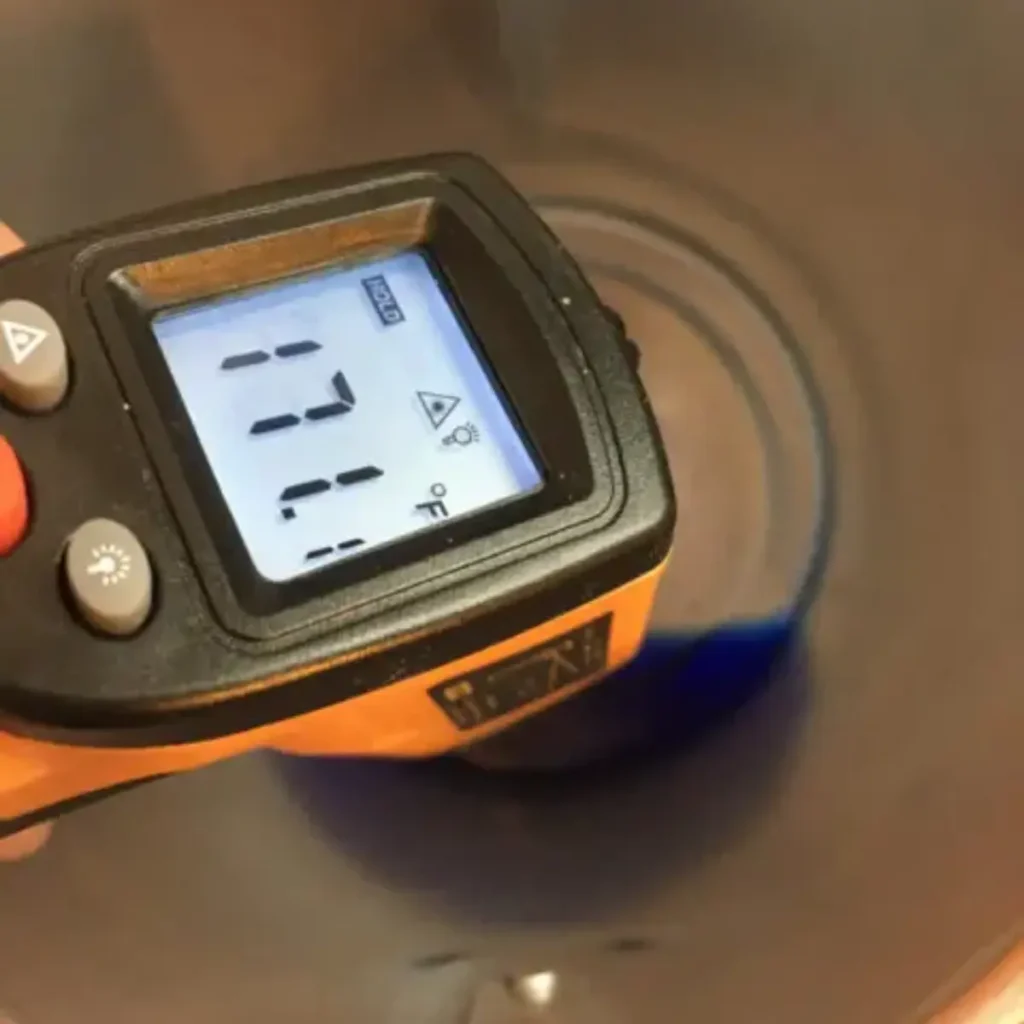 checking temperature of soy wax