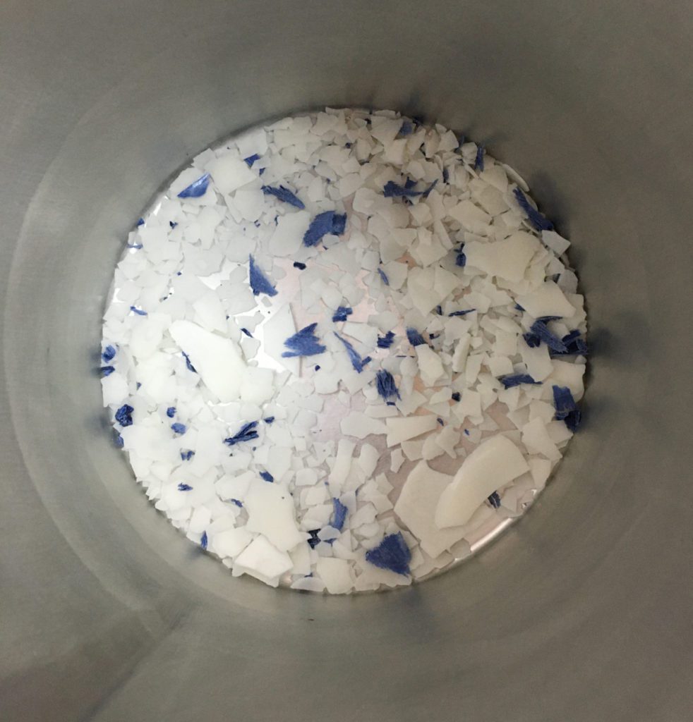 soy and colorant in pouring pot