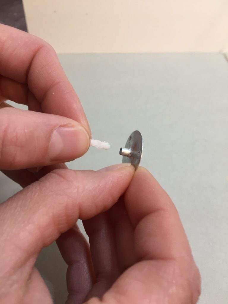 treading wick into metal tab