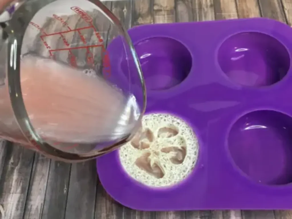 pouring melt and pour into mold over luffa