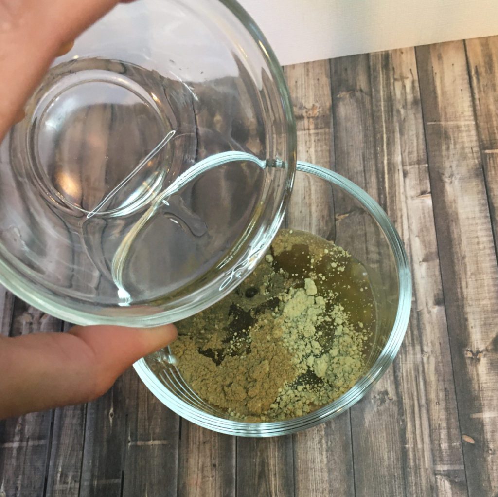 adding water to face mask with green tea