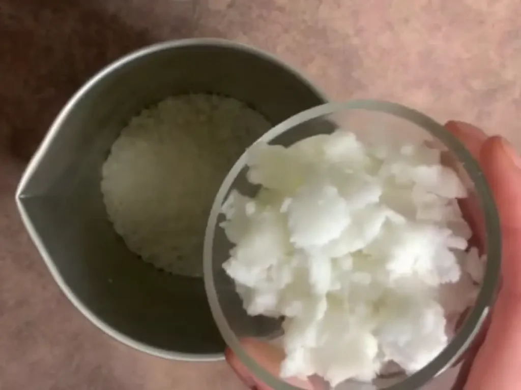 putting coconut oil and beeswax in double boiler