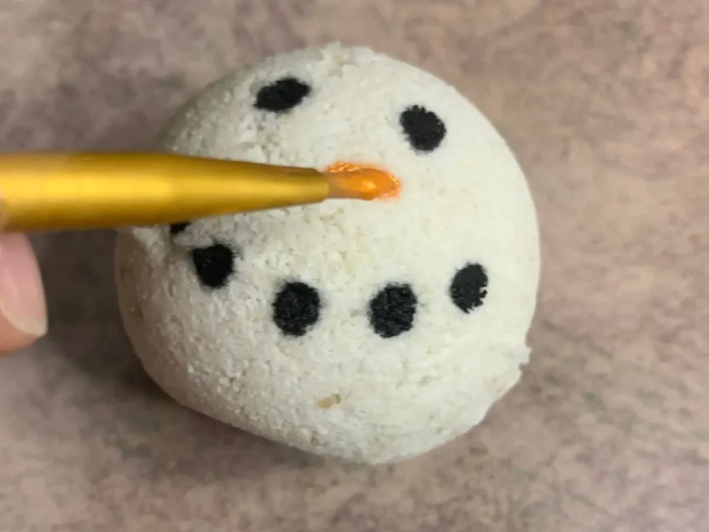 painting bath bomb snowman nose