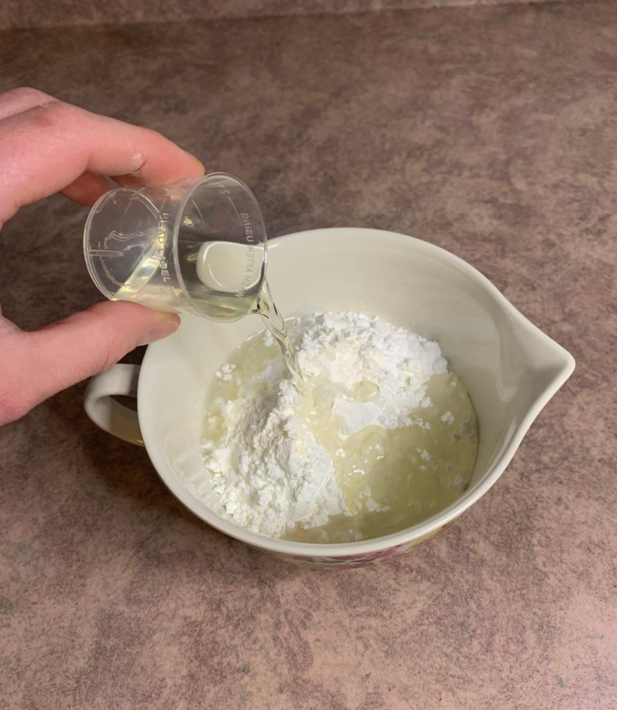 adding liquid ingredients to bubble bar