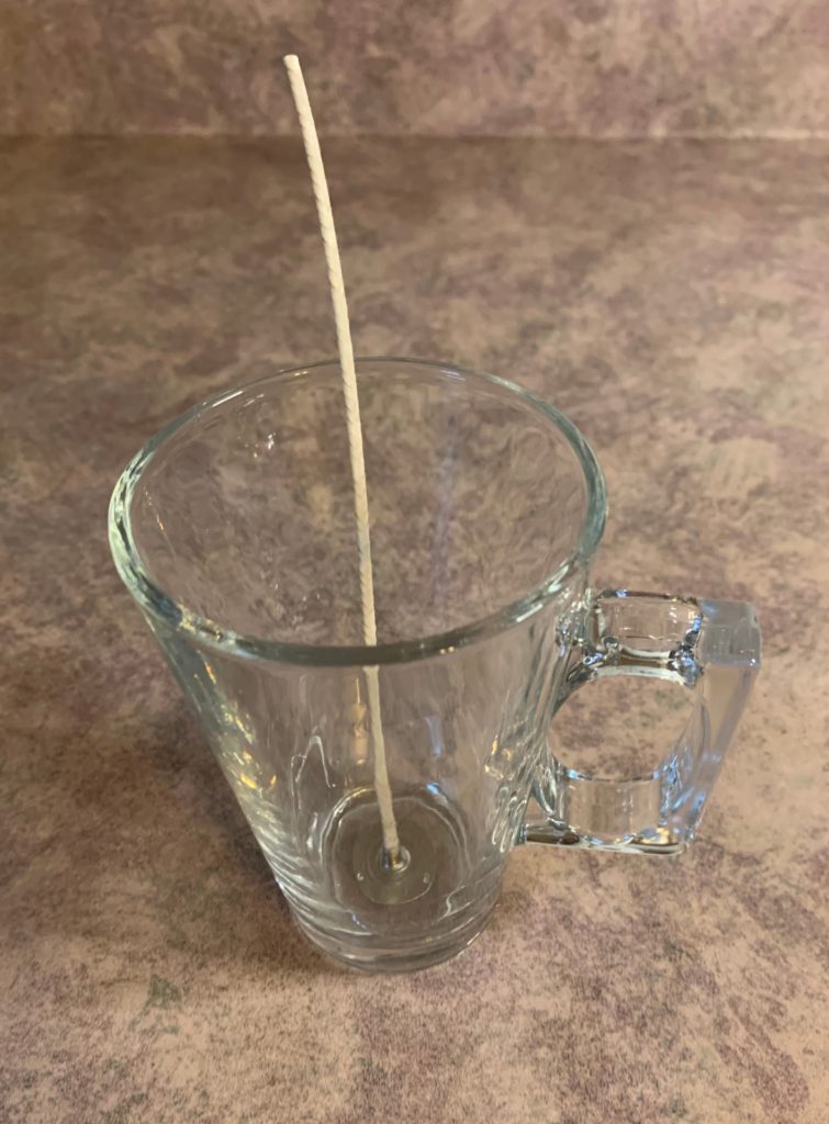 candle wick in container