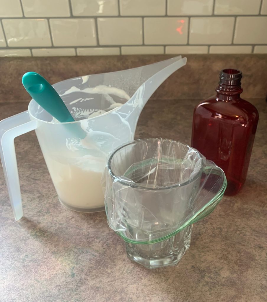 getting piping bag ready to put lotion in container