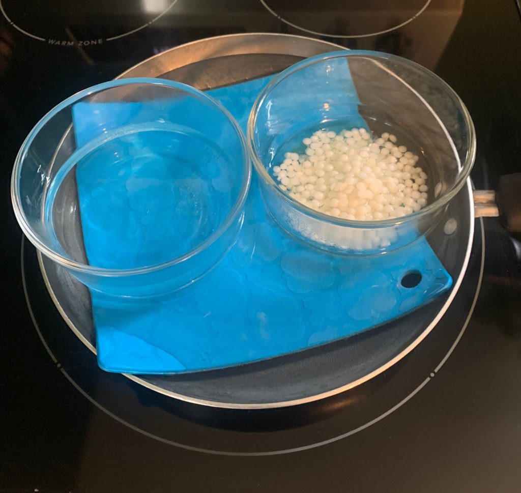 placing lotion ingredients on a double boiler