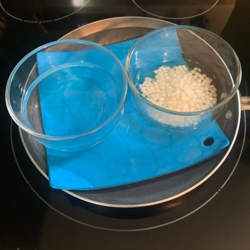 placing water and oil phase on double boiler to melt for lotion