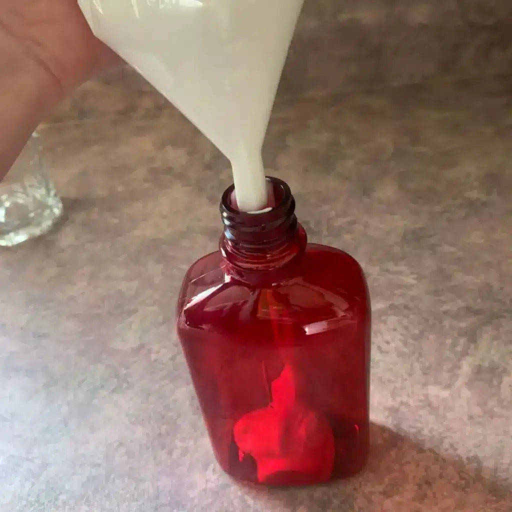 using pipping bag to get lotion into bottle after thick