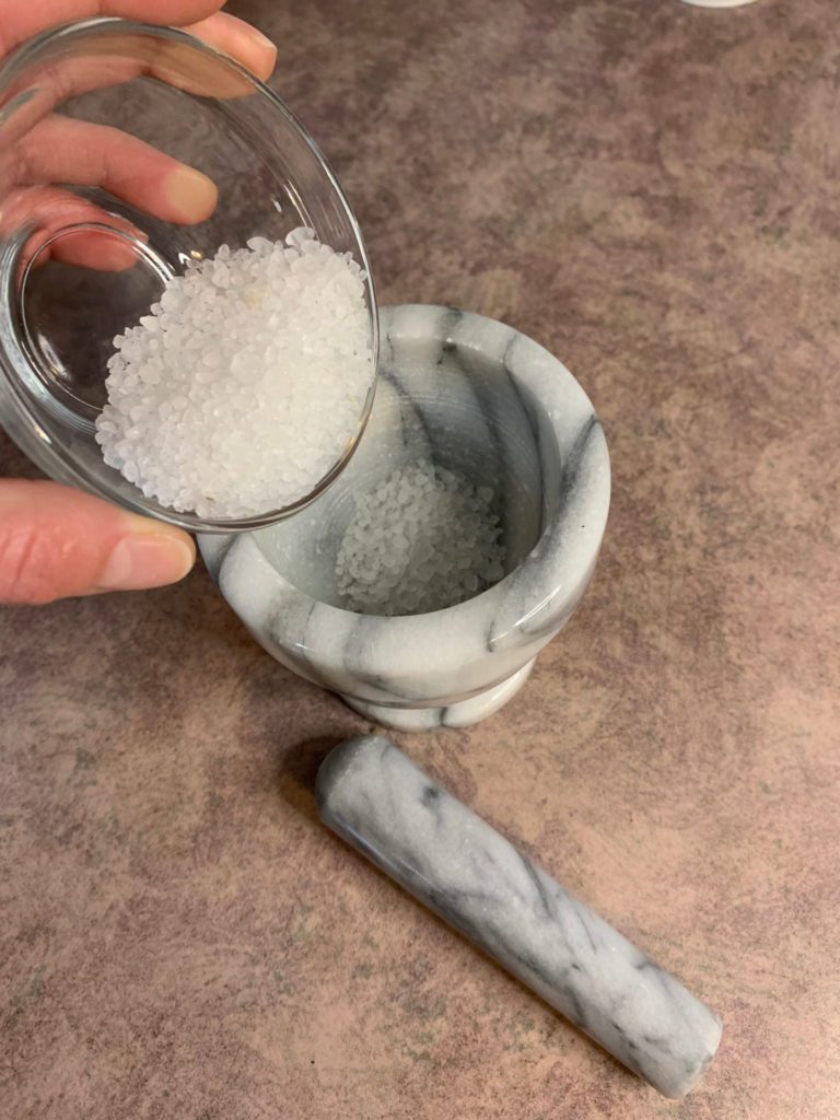 sea salt in mortar and pestle