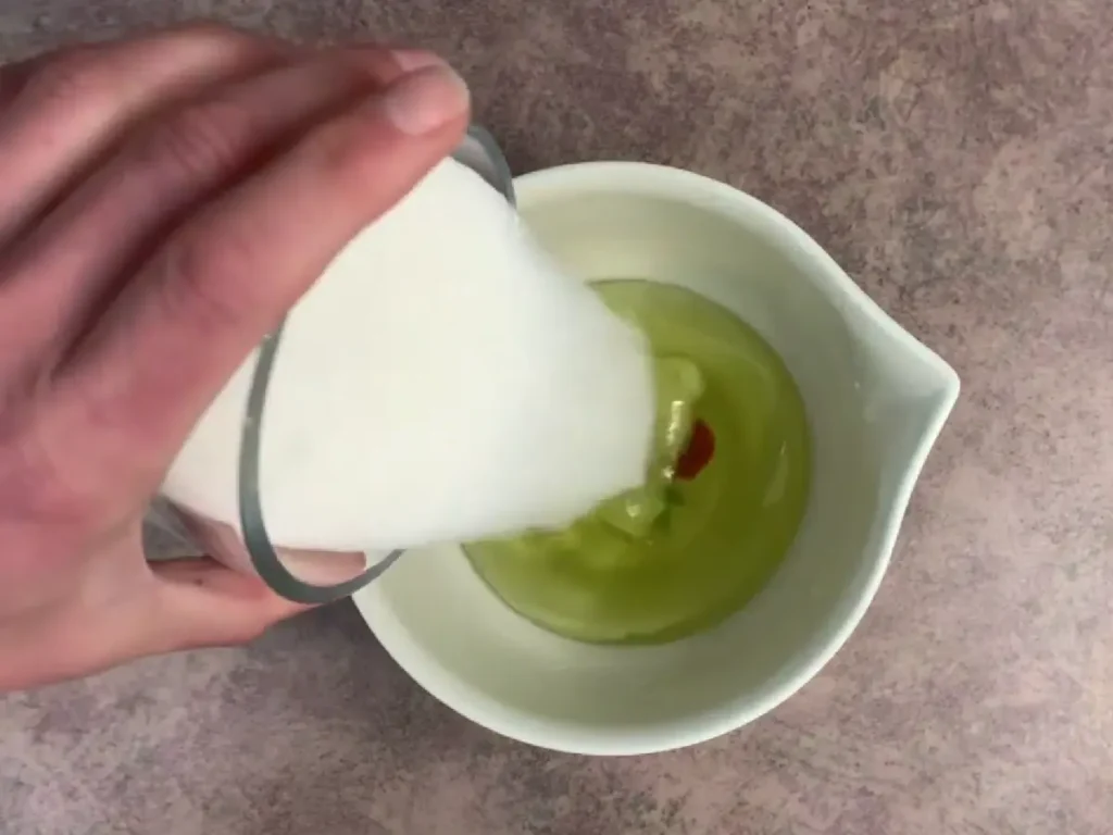 adding sugar to melted oils