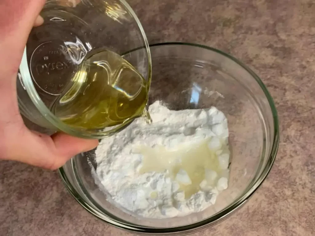 adding wet and dry ingredients together