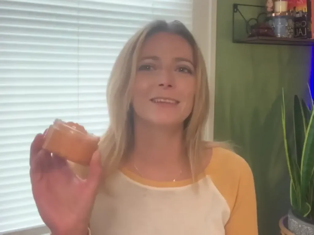 summer rain (Jami) holding finished pumpkin scrub