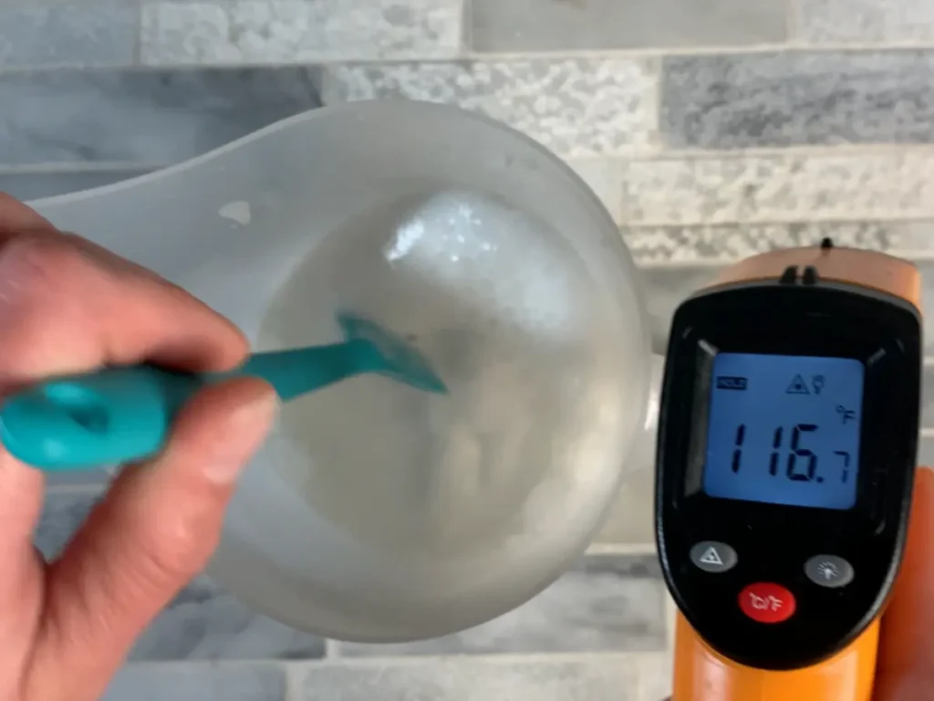 checking lotion temperature before adding cool down