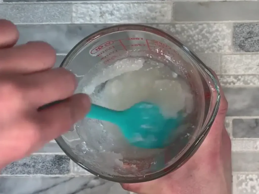mixing all ingredients together dead sea salt scrub