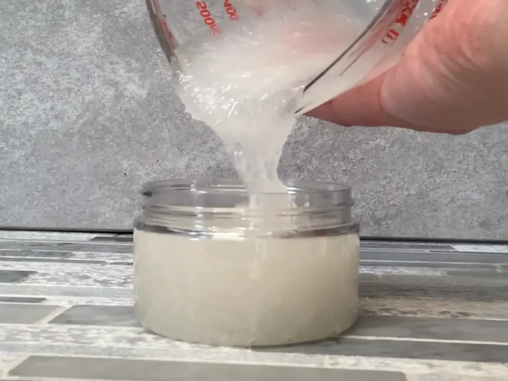 pouring dead sea salt into container