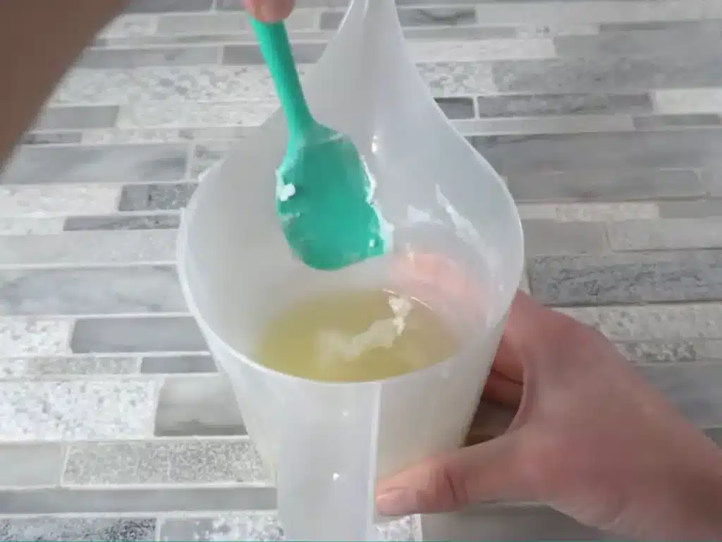allowing wax to cool slightly before mixing with a hand mixer