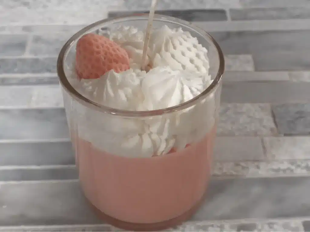strawberry embed on top of whipped candle topping