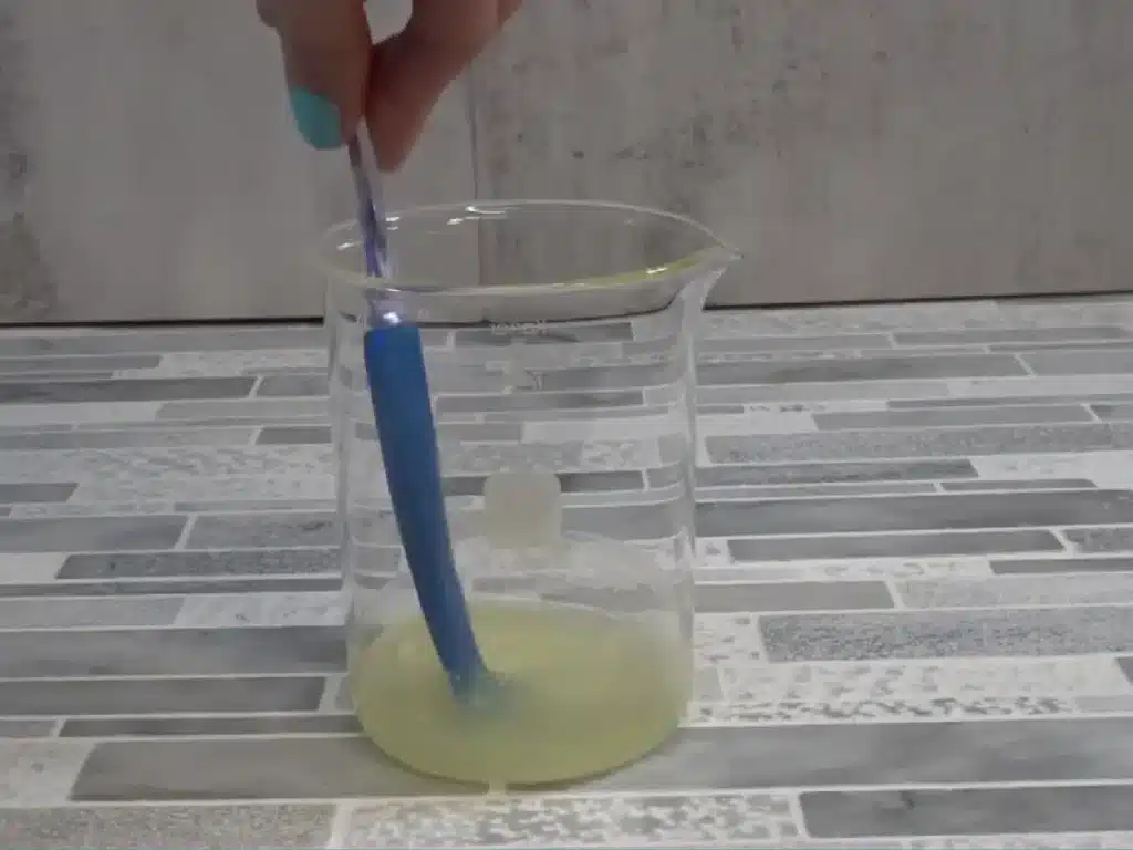 allowing melted emulsifier and oils to cool before adding cool down