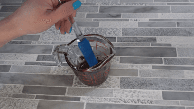 mixing melt and pour soap for chocolate chip mold embed