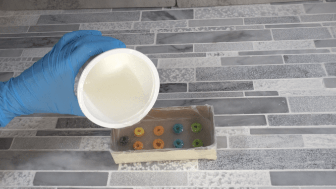 pouring silicone into mold