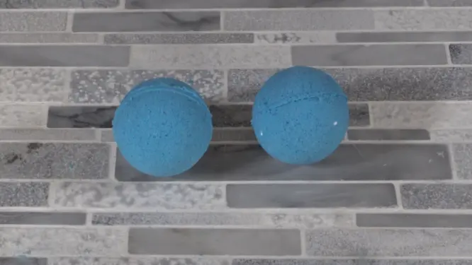 Finished bath bombs drying on a tray