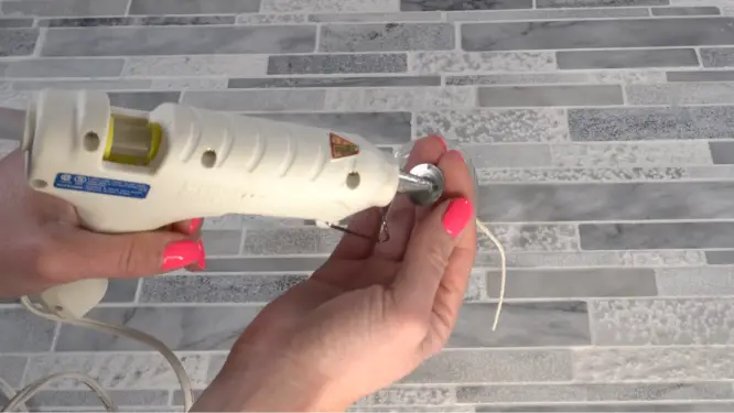 massage candle placing candle wick