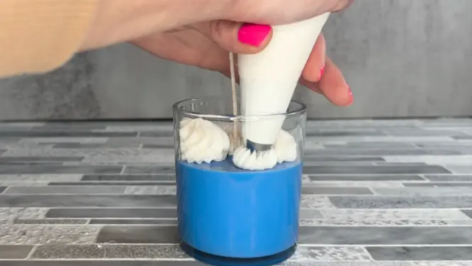 whipped candle pipping the top