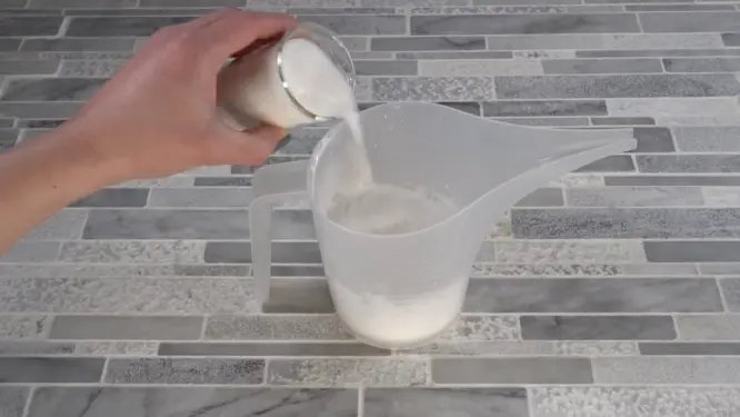 whipping foaming sugar scrub adding the sugar