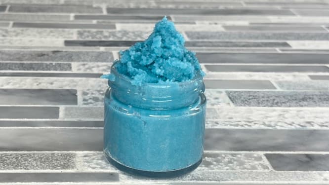 DIY creamy lip scrub made with sugar, shea butter and almond oil