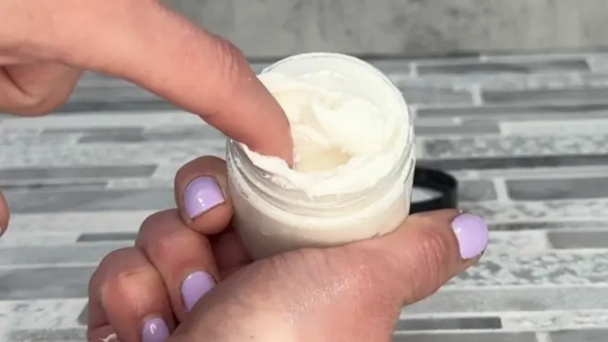 finished whipped shea butter in glass jar