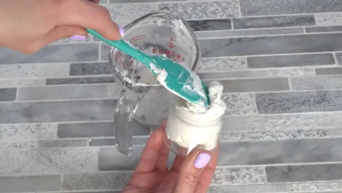 finished whipped shea butter in glass jar
