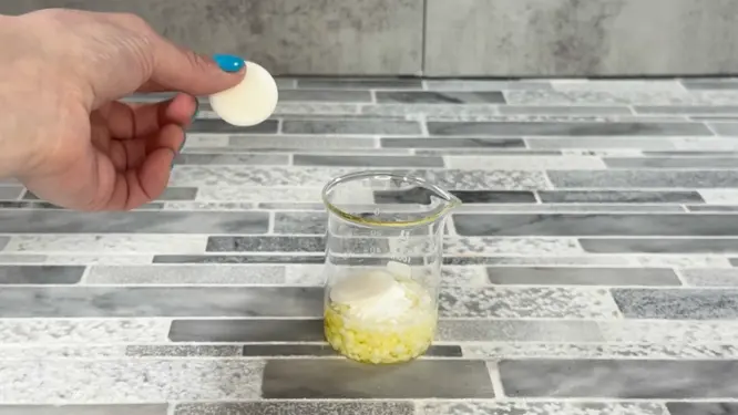 adding oil phase to heat safe container