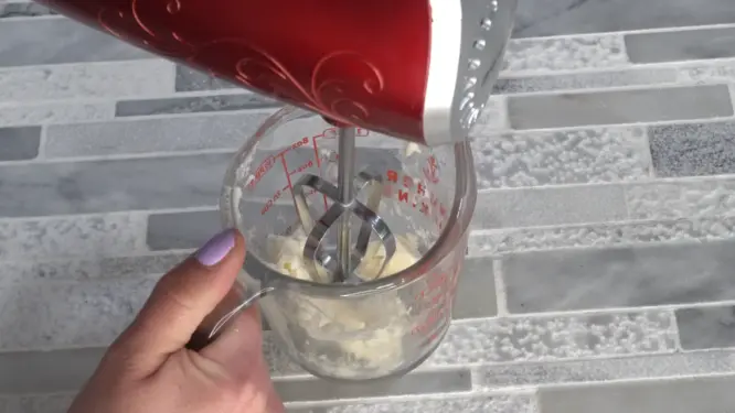 mashing shea butter before whipping body butter