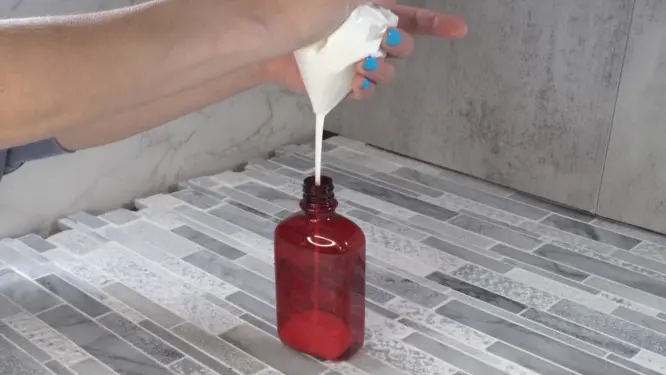 piping final lotion into container