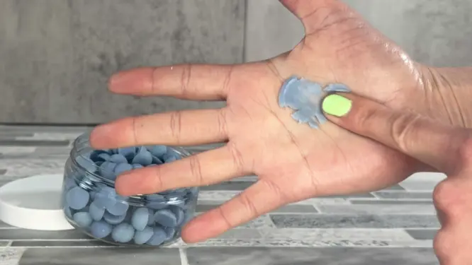 smooshing lotion dots on skin