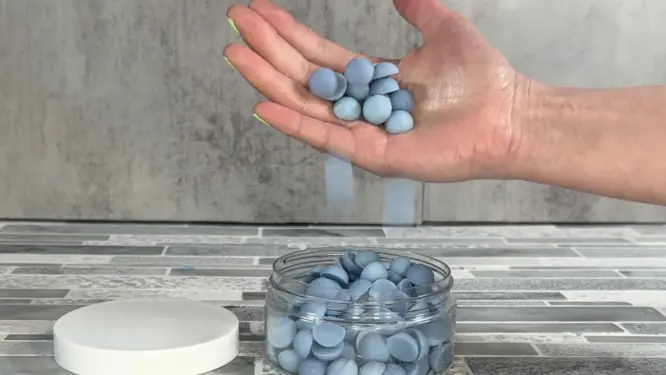 storing lotion dots in container