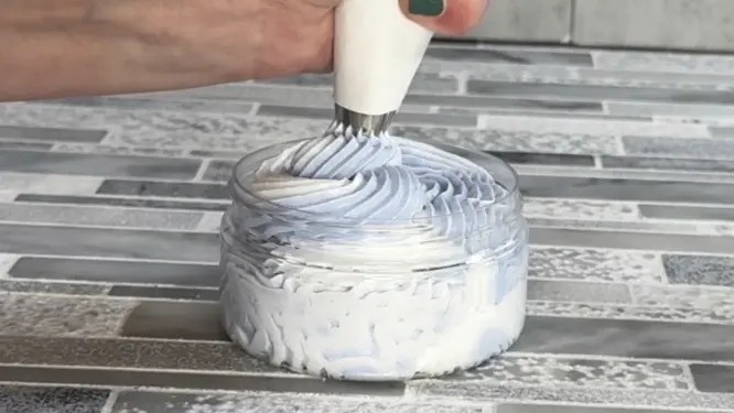 pipping whipped soap into container
