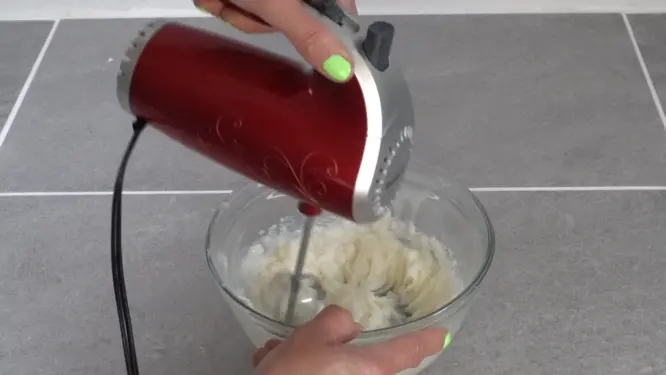 mixing candle wax with a hand mixer