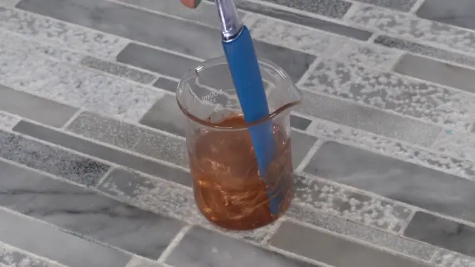 mixing mica powder into lip gloss