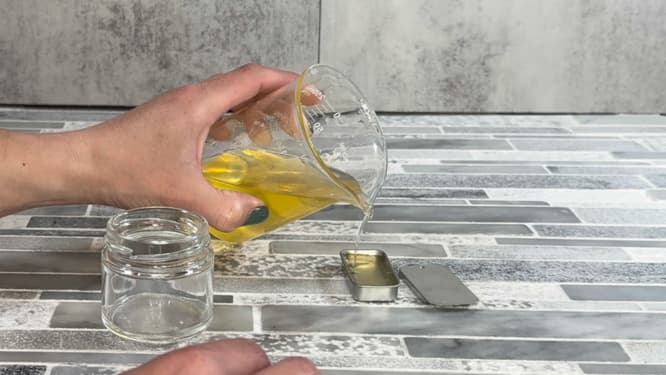 pouring cuticle balm into container