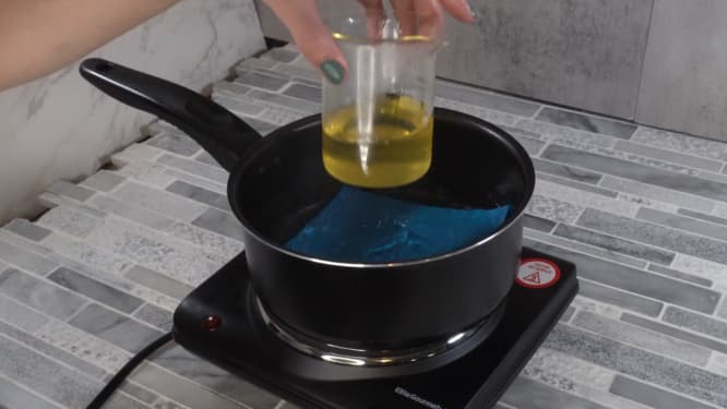 removing heated oils from double boiler